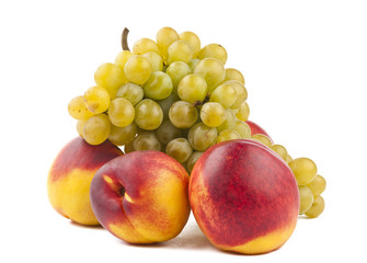ripe peach with grapes isolated