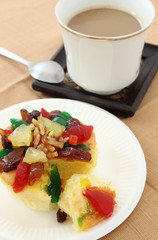 fruit cake and cup of hot coffee