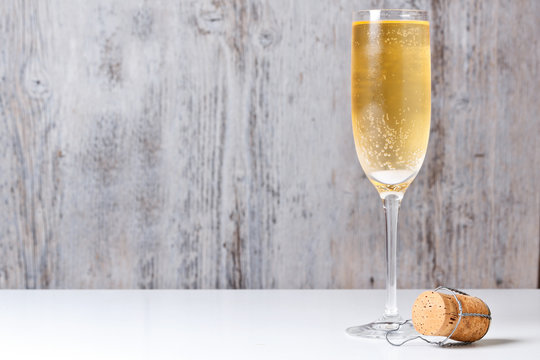 Champagne glass and cork