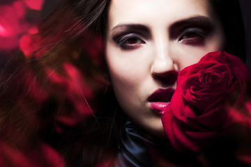 beautiful woman with big red rose