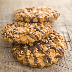 chocolate chip cookies on wooden table (selective focus)