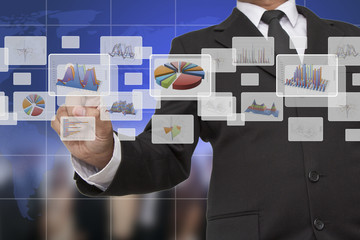 businessman touch graph,chart, diagram