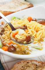 Noodle soup with mushrooms and vegetables
