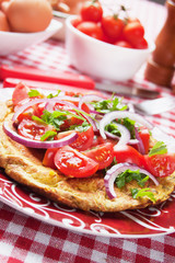 Omelet with tomato salad