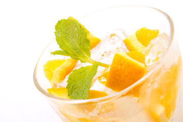 Sunkist orange cut in a glass decorate with mint leaf