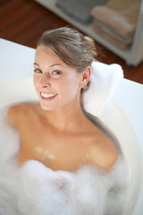 Obraz na płótnie Canvas Upper view of gorgeous woman taking a bath