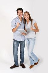 Naklejka premium Young couple doing shopping on internet