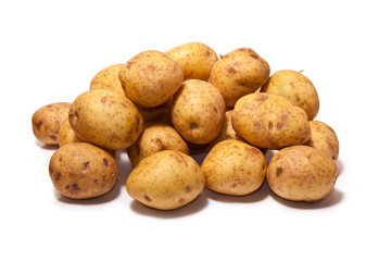 White Potatoes isolated on a white studio background.