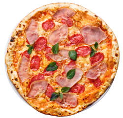 round pizza with ham, tomatoes and greens
