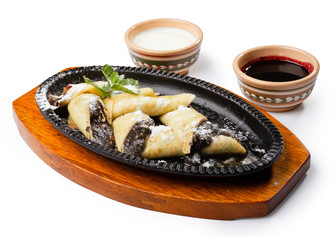 pancakes with poppy seeds and nuts with sour cream and cherry ja