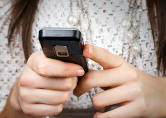 mobile phone in the hands