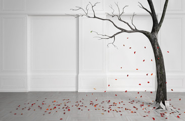 Old tree with falling leaves in a white room.