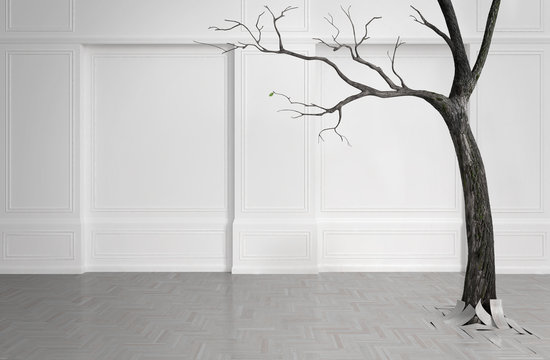 Old tree with falling leaves in a white room.