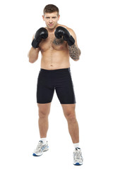 Full length portrait of attractive boxer posing