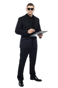 Male Bouncer Holding Clipboard