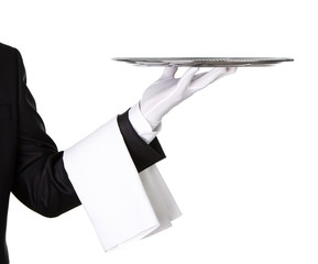 Waiter holding empty silver tray isolated on white background - obrazy, fototapety, plakaty