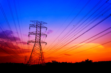 Silhouette electricity pylons