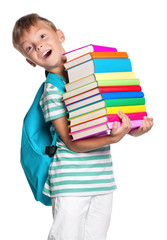 Little boy with books