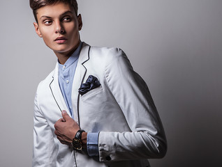 Elegant young handsome man. Studio fashion portrait.