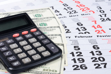 Banknotes of dollar with the calculator