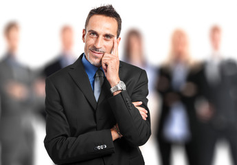 Confident chairman with his team