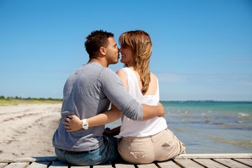 Couple Kissing on a Summer Beach