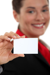 Businesswoman presenting card