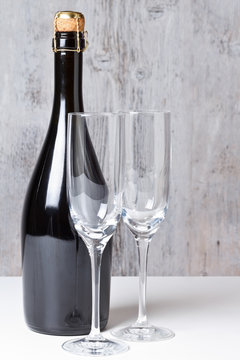 Champagne glasses with bottle