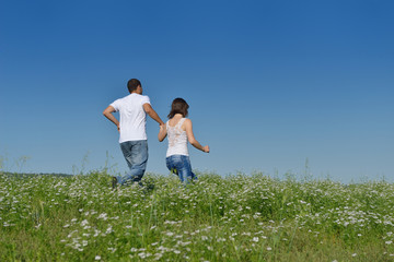 happy couple in wheat field