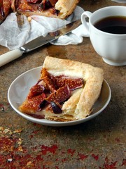 A piece of cake with figs from puff pastry