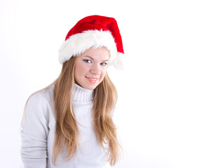 Beautiful girl in a Christmas hat