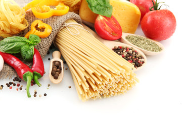 Pasta spaghetti, vegetables and spices, isolated on white