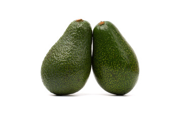 Two avocado on white background