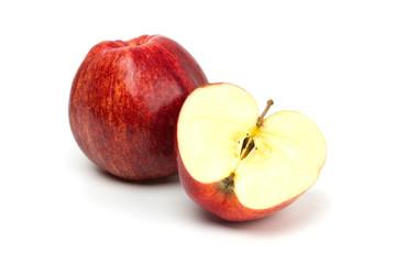 Cut red apple isolated on white background