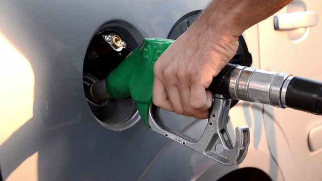 refueling a car with unleaded petrol