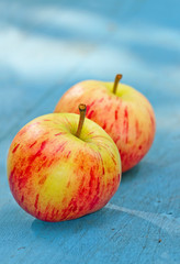Two red apples