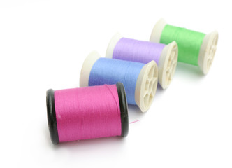 Spools of thread isolated on a white background