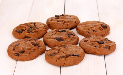 Chocolate chips cookie on wooden background