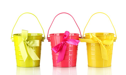 Colorful buckets isolated on white