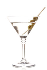 Martini glass and olives isolated on white