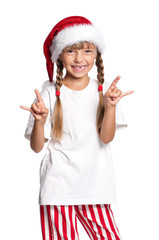 Fototapeta na wymiar Little girl in Santa hat