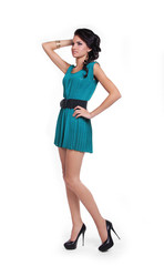 Fashion model girl posing in trendy shoes isolated on white