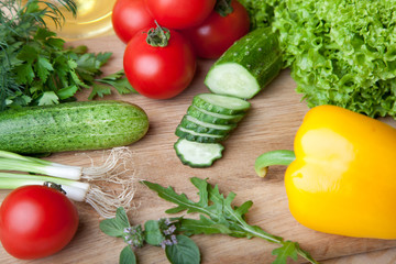 Fresh vegetables on cutting board.