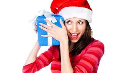 girl in Santa hat with gifts