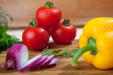 Fresh vegetables on cutting board.