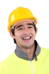 Worker wearing reflective jacket