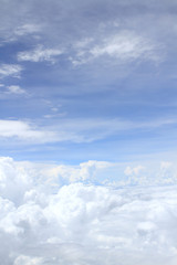 Airplane above clouds