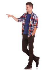 young man pointing in a direction