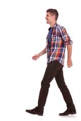 Fototapeta premium side view of man walking