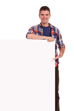 young man presenting on banner